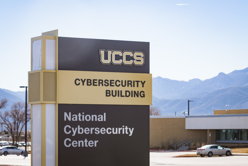 Cybersecurity Building with Mountains in Background