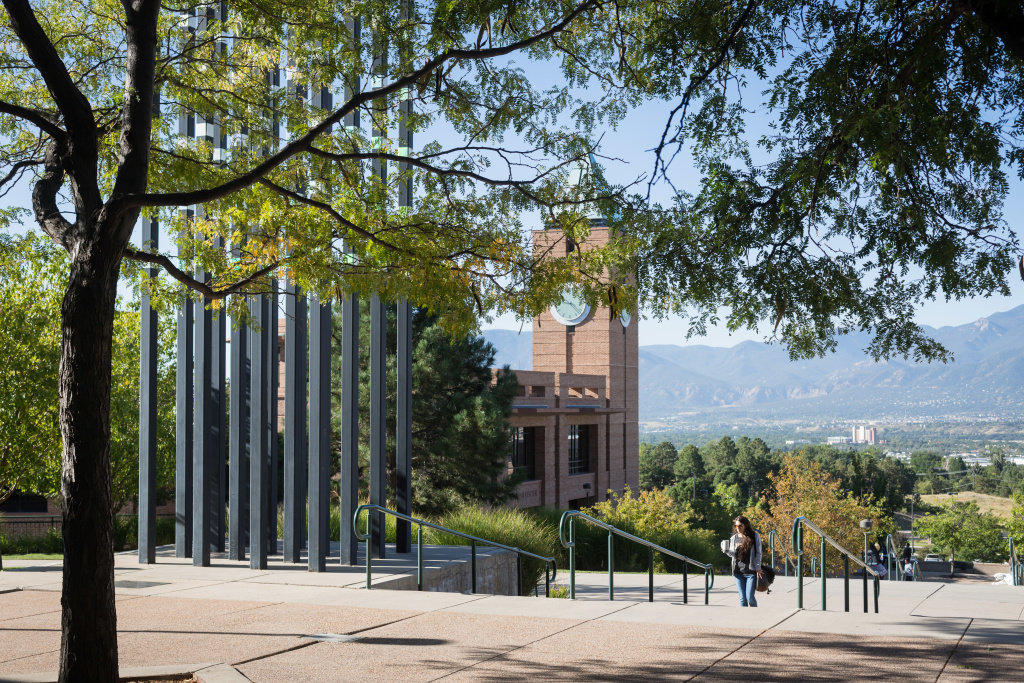 student walking into the Engineering building