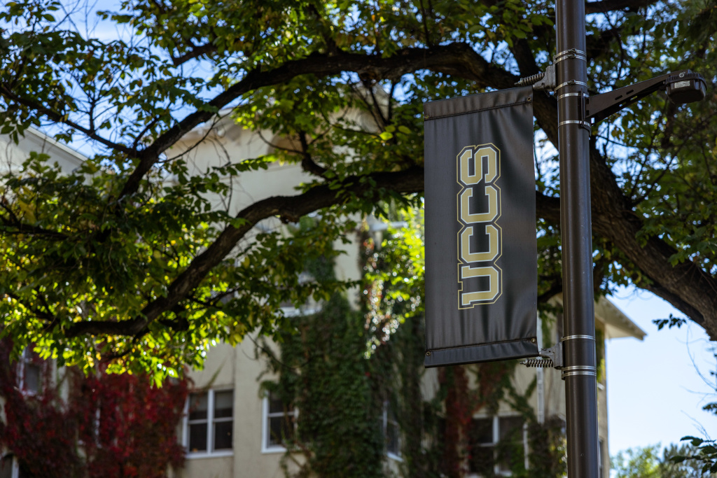 UCCS flag in front of Main Hall