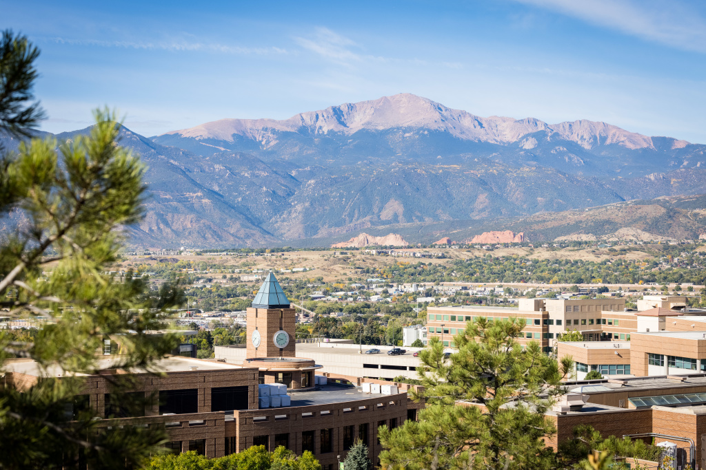 UCCS campus buildings with mountains in the background