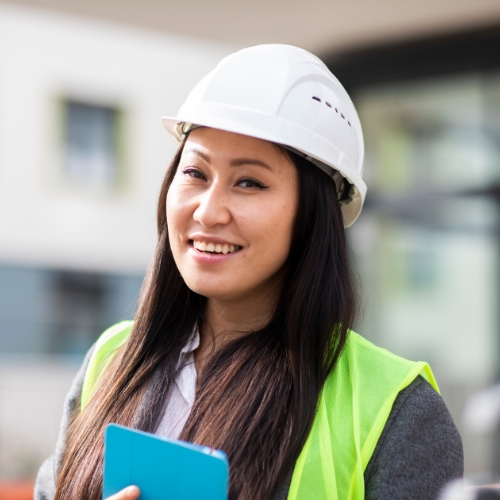 Photo of an Engineering Student in a white hardhat